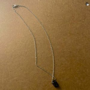 Silver necklace with black stone